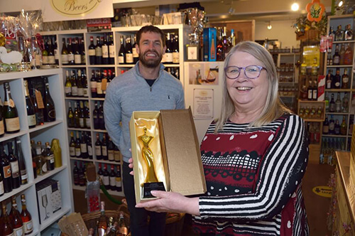 Jane Cuthbertson of Barrica Wines collecting her She Inspires award from Kelvin Fletcher